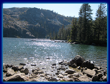 majestic lake at mount shasta with nice sunlight pouring down on the water